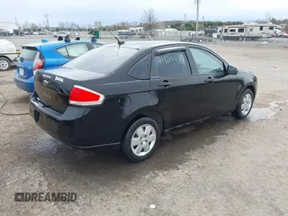 2010 Ford Focus S with VIN 1FAHP3EN5AW232831, listed as a IAAI auction lot 41865007 with 244,453 mi miles. Bid and sale history available at carsss.com. Image 4.