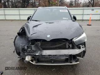 2018 BMW X1 xDrive28i with VIN WBXHT3C31J5F89068, listed as a Copart auction lot 52266655 with 145,375 mi miles and Clean Title. Bid and sale history available at carsss.com. Image 5.