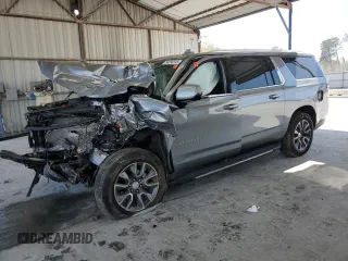 2023 Chevrolet Suburban LT z VIN 1GNSCCKD5PR308814, wystawiony jako Copart lot #50396345 z przebiegiem 33 659 mil mil oraz Szkoda całkowita • Salvage title. Historia ofert i sprzedaży dostępna na DreamBid. Obrazek 1.