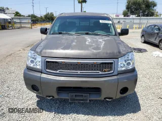 2005 Nissan Titan SE with VIN 1N6AA06AX5N555112, listed as a Copart auction lot 60567975 with 289,585 mi miles and Clean title. Bid and sale history available at DreamBid. Image 5.