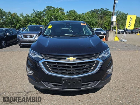 2020 Chevrolet Equinox LT with VIN 2GNAXJEVXL6233574, listed as a IAAI auction lot 42573162 with 58,591 mi miles and . Bid and sale history available at DreamBid. Image 3.