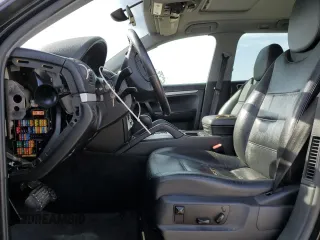 2005 Porsche Cayenne z VIN WP1AA29P65LA24059, wystawiony jako Copart lot #57484235 z przebiegiem Nie podano mil oraz Szkoda całkowita • Salvage title. Historia ofert i sprzedaży dostępna na DreamBid. Obrazek 7.