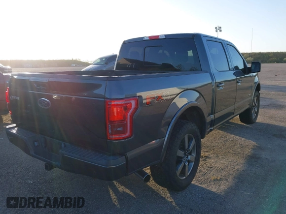 2015 Ford F-150 XLT with VIN 1FTEW1EG2FFC78324, listed as a IAAI auction lot 40708845 with 123,939 mi miles. Bid and sale history available at carsss.com. Image 4.