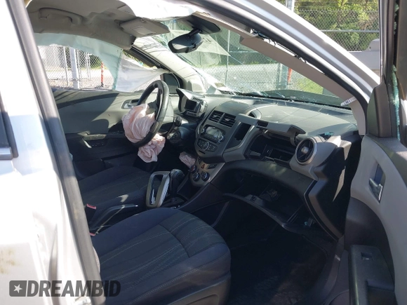 2012 Chevrolet Sonic LT with VIN 1G1JC6SH5C4167574, listed as a IAAI auction lot 42133100 with 59,473 mi miles and . Bid and sale history available at DreamBid. Image 5.