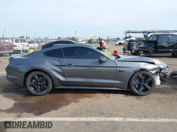 2022 Ford Mustang GT with VIN 1FA6P8CF2N5131421, listed as a IAAI auction lot 42047492 with 21,376 mi miles and . Bid and sale history available at DreamBid. Image 14.