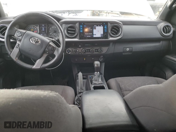 2017 Toyota Tacoma SR5 with VIN 3TMCZ5AN2HM063152, listed as a Copart auction lot 43630775 with 77,103 mi miles and Salvage Title. Bid and sale history available at DreamBid. Image 8.