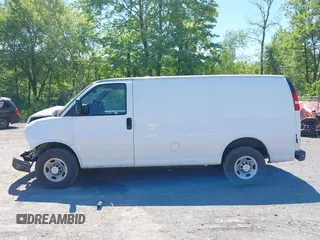2014 Chevrolet Express Cargo Van with VIN 1GCWGFCA2E1210307, listed as a IAAI auction lot 39559260 with 213,814 mi miles. Bid and sale history available at carsss.com. Image 14.
