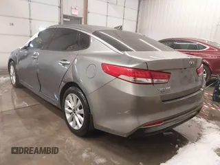 2017 Kia Optima EX with VIN 5XXGU4L36HG143321, listed as a IAAI auction lot 41589617 with 116,972 mi miles. Bid and sale history available at carsss.com. Image 3.