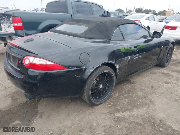 2008 Jaguar XK with VIN SAJWA44B885B23686, listed as a IAAI auction lot 41459334 with 105,432 mi miles. Bid and sale history available at carsss.com. Image 4.