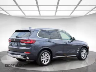 2021 BMW X5 xDrive45e with VIN 5UXTA6C04M9D73XXX, listed as a Copart auction lot 57567295 with 7,060 mi miles and Clean title. Bid and sale history available at DreamBid. Image 4.