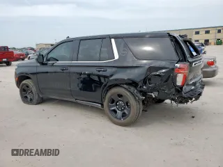 2023 Chevrolet Tahoe Commercial with VIN 1GNSCLED7PR428027, listed as a Copart auction lot 56738455 with 6,599 mi miles and Salvage title. Bid and sale history available at DreamBid. Image 2.