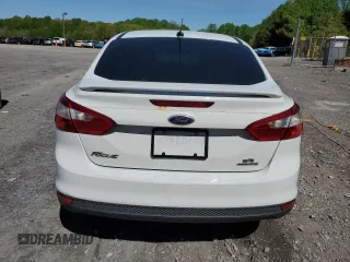 2013 Ford Focus SE z VIN 1FADP3F24DL128940, wystawiony jako Copart lot #54798665 z przebiegiem Nie podano mil oraz Tytuł czysty. Historia ofert i sprzedaży dostępna na DreamBid. Obrazek 6.
