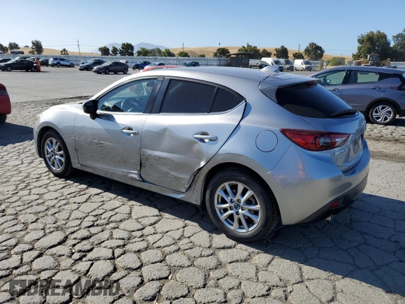 2015 Mazda 3 i Grand Touring z VIN JM1BM1M70F1260802, wystawiony jako Copart lot #60662705 z przebiegiem 89 974 mil mil oraz Szkoda całkowita • Salvage title. Historia ofert i sprzedaży dostępna na DreamBid. Obrazek 2.