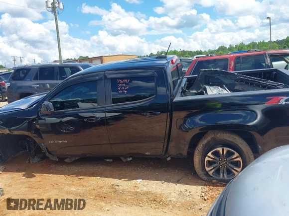 2022 Chevrolet Colorado 4WD Z71 z VIN 1GCGTDEN5N1327500, wystawiony jako IAAI lot #42265450 z przebiegiem 48 680 mil mil oraz . Historia ofert i sprzedaży dostępna na DreamBid. Obrazek 14.