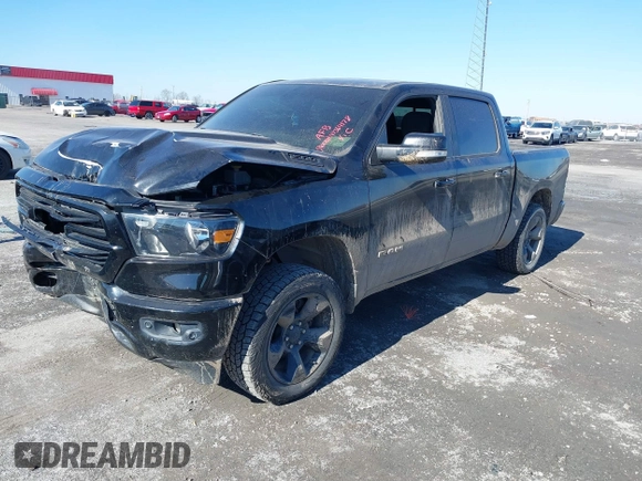 2019 Ram 1500 Big Horn/Lone Star with VIN 1C6RRFFG0KN785072, listed as a IAAI auction lot 41364178 with 126,476 mi miles. Bid and sale history available at carsss.com. Image 2.