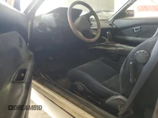 1989 Toyota MR2 z VIN JT2AW15J7K0154517, wystawiony jako Copart lot #77944134 z przebiegiem 204 412 mil mil oraz Szkody całkowita. Historia ofert i sprzedaży dostępna na DreamBid. Obrazek 8.