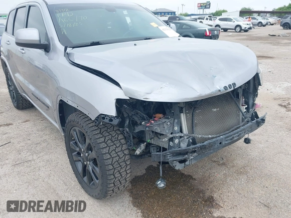 2019 Jeep Grand Cherokee Laredo E with VIN 1C4RJFAG9KC670974, listed as a IAAI auction lot 42333028 with 163,958 mi miles and . Bid and sale history available at DreamBid. Image 6.