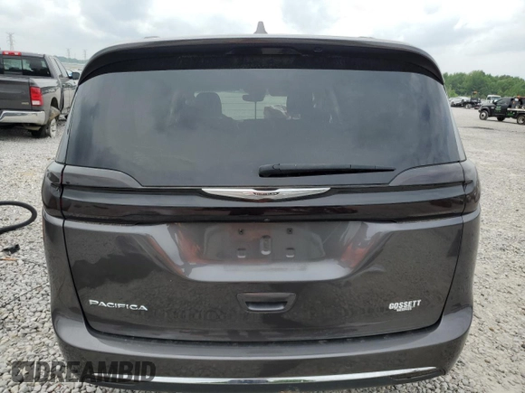 2021 Chrysler Pacifica Touring with VIN 2C4RC1FGXMR550164, listed as a Copart auction lot 57297585 with 10,222 mi miles and Salvage title. Bid and sale history available at DreamBid. Image 6.