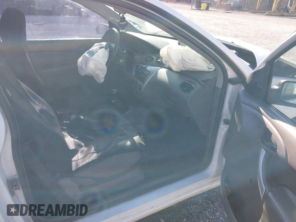 2004 Ford Focus ZX3 with VIN 3FAFP313X4R107035, listed as a IAAI auction lot 41204355 with 185,081 mi miles and . Bid and sale history available at carsss.com. Image 5.