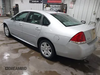 2014 Chevrolet Impala LT with VIN 2G1WB5E37E1178089, listed as a IAAI auction lot 42450127 with 58,277 mi miles and . Bid and sale history available at DreamBid. Image 3.