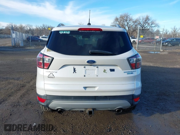 2017 Ford Escape Titanium with VIN 1FMCU9J98HUA04994, listed as a IAAI auction lot 41139988 with 136,989 mi miles. Bid and sale history available at carsss.com. Image 16.