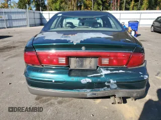 1999 Buick Regal GS with VIN 2G4WF5218X1591703, listed as a Copart auction lot 76690784 with 0 mi miles and Non Repairable. Bid and sale history available at carsss.com. Image 6.