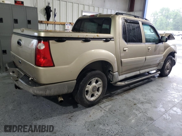 2003 Ford Explorer Sport Trac XLS with VIN 1FMZU67E53UA09799, listed as a Copart auction lot 56620165 with 196,896 mi miles and Salvage title. Bid and sale history available at DreamBid. Image 3.
