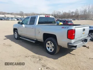 2016 Chevrolet Silverado 1500 LT with VIN 1GCVKREC4GZ125676, listed as a IAAI auction lot 42006237 with 114,699 mi miles. Bid and sale history available at carsss.com. Image 3.