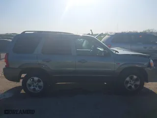 2004 Mazda Tribute ES with VIN 4F2CZ06184KM32333, listed as a IAAI auction lot 42041183 with 33,646 mi miles. Bid and sale history available at carsss.com. Image 13.