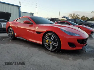 2019 Ferrari Portofino z VIN ZFF89FPA0K0242592, wystawiony jako Copart lot #74249014 z przebiegiem Nie podano mil oraz Nie do naprawy. Historia ofert i sprzedaży dostępna na DreamBid. Obrazek 4.