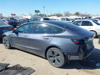 2022 Tesla Model 3 with VIN 5YJ3E1EAXNF326354, listed as a IAAI auction lot 41651872 with 27,922 mi miles and . Bid and sale history available at DreamBid. Image 3.