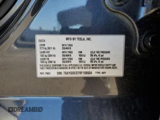 2024 Tesla Model Y with VIN 7SAYGDED7RF108604, listed as a Copart auction lot 48384825 with 24,603 mi miles and Salvage Title. Bid and sale history available at DreamBid. Image 15.