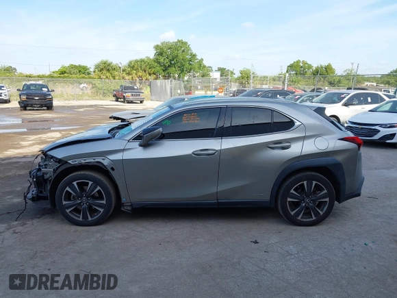2020 Lexus UX 250h with VIN JTHX9JBHXL2033589, listed as a IAAI auction lot 42113363 with 71,669 mi miles and . Bid and sale history available at DreamBid. Image 14.