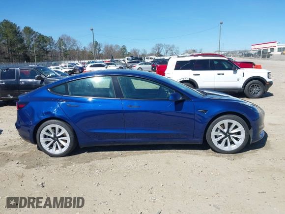 2021 Tesla Model 3 Long Range with VIN 5YJ3E1EB3MF031457, listed as a IAAI auction lot 41630758 with 71,113 mi miles and . Bid and sale history available at carsss.com. Image 13.