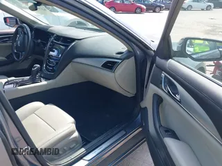2019 Cadillac CTS Luxury AWD z VIN 1G6AX5SX3K0121389, wystawiony jako IAAI lot #42269822 z przebiegiem 29 677 mil mil oraz . Historia ofert i sprzedaży dostępna na DreamBid. Obrazek 5.