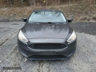2016 Ford Focus SE with VIN 1FADP3F2XGL303275, listed as a Copart auction lot 53241255 with 106,338 mi miles and Salvage Title. Bid and sale history available at carsss.com. Image 5.