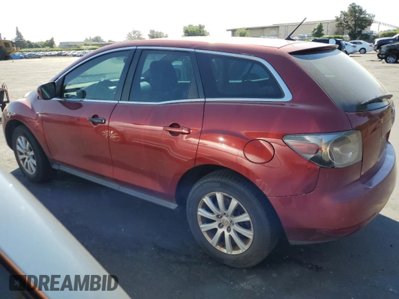 2010 Mazda CX-7 SV z VIN JM3ER2WM3A0321623, wystawiony jako Copart lot #53916965 z przebiegiem 216 749 mil mil oraz Czysty tytuł • Clean title. Historia ofert i sprzedaży dostępna na DreamBid. Obrazek 2.