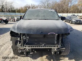 2021 Chevrolet Tahoe High Country with VIN 1GNSCTKLXMR105453, listed as a Copart auction lot 82807274 with 56,534 mi miles and Salvage Title. Bid and sale history available at carsss.com. Image 5.