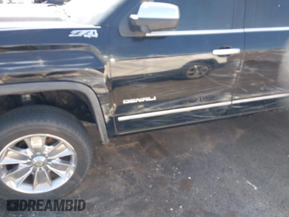 2014 GMC Sierra 1500 Denali z VIN 3GTU2WEC2EG302474, wystawiony jako IAAI lot #41881222 z przebiegiem 197 221 mil mil oraz . Historia ofert i sprzedaży dostępna na DreamBid. Obrazek 6.