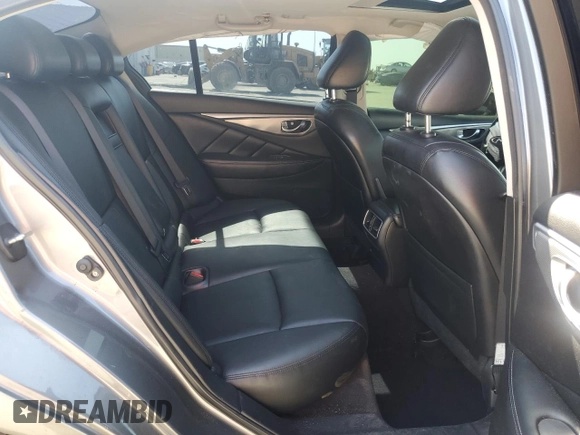 2014 Infiniti Q50 Premium with VIN JN1BV7AP2EM677469, listed as a Copart auction lot 61627125 with 106,670 mi miles and Salvage title. Bid and sale history available at DreamBid. Image 10.