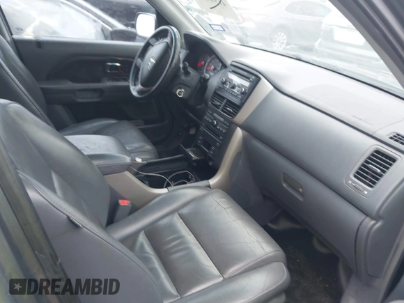 2007 Honda Pilot EX-L with VIN 5FNYF18697B002843, listed as a IAAI auction lot 41549328 with 202,365 mi miles and . Bid and sale history available at DreamBid. Image 5.