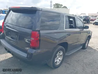 2017 Chevrolet Tahoe Commercial with VIN 1GNLCDEC2HR256539, listed as a IAAI auction lot 41718466 with 202,134 mi miles. Bid and sale history available at carsss.com. Image 4.