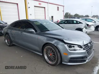 2014 Audi A7 Prestige z VIN WAU2GAFC6EN121473, wystawiony jako IAAI lot #42627131 z przebiegiem 59 421 mil mil oraz . Historia ofert i sprzedaży dostępna na DreamBid. Obrazek 1.