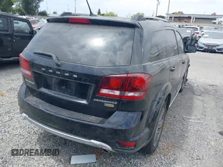 2017 Dodge Journey Crossroad Plus z VIN 3C4PDCGG9HT576434, wystawiony jako IAAI lot #42561944 z przebiegiem 118 666 mil mil oraz . Historia ofert i sprzedaży dostępna na DreamBid. Obrazek 4.