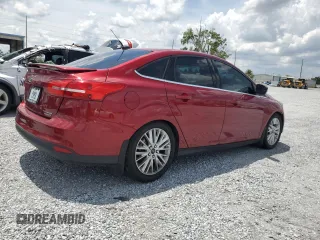 2016 Ford Focus Titanium with VIN 1FADP3J29GL274147, listed as a Copart auction lot 61377575 with 88,181 mi miles and Salvage title. Bid and sale history available at DreamBid. Image 3.