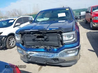 2019 GMC Sierra 1500 SLE z VIN 2GTV2MEC5K1102900, wystawiony jako IAAI lot #41996612 z przebiegiem 69 502 mil mil oraz . Historia ofert i sprzedaży dostępna na DreamBid. Obrazek 13.