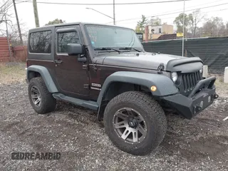2013 Jeep Wrangler Sport with VIN 1C4AJWAG5DL679350, listed as a IAAI auction lot 40893582 with 61,191 mi miles and . Bid and sale history available at carsss.com. Image 1.