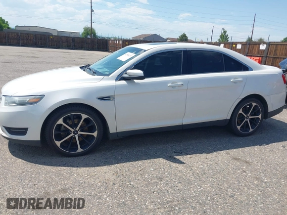 2015 Ford Taurus SEL with VIN 1FAHP2H8XFG203309, listed as a IAAI auction lot 42598215 with 163,190 mi miles and . Bid and sale history available at DreamBid. Image 14.