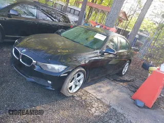 2015 BMW 3 Series 328i with VIN WBA3A5C59FF609332, listed as a IAAI auction lot 41994091 with 194,245 mi miles. Bid and sale history available at carsss.com. Image 2.