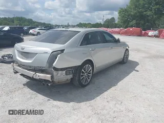 2018 Cadillac CT6 Luxury AWD z VIN 1G6KD5RS7JU101256, wystawiony jako IAAI lot #42139045 z przebiegiem 78 820 mil mil oraz . Historia ofert i sprzedaży dostępna na DreamBid. Obrazek 4.